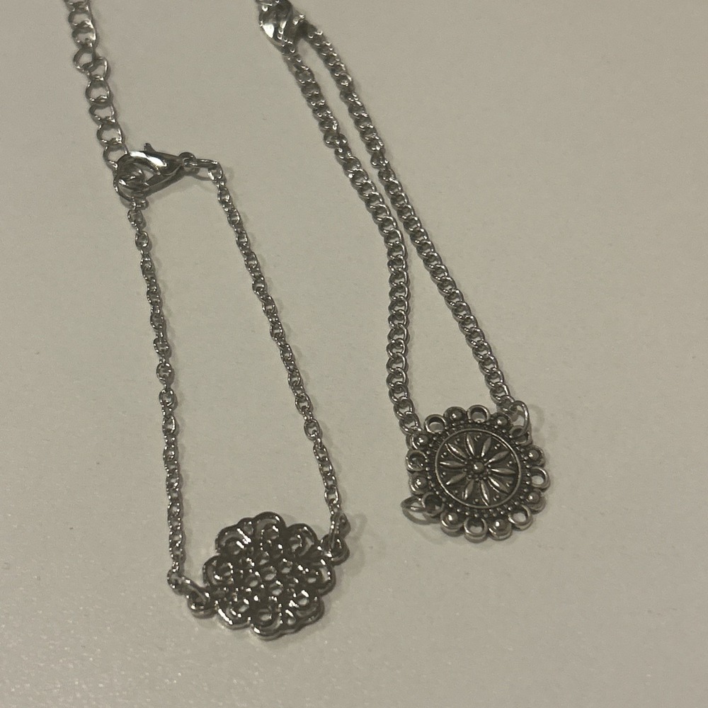 2 Silver‎ Ankle Brackets